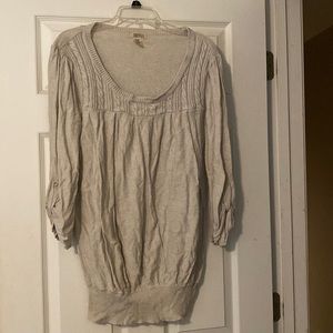 Tan sweater with neckline detailing